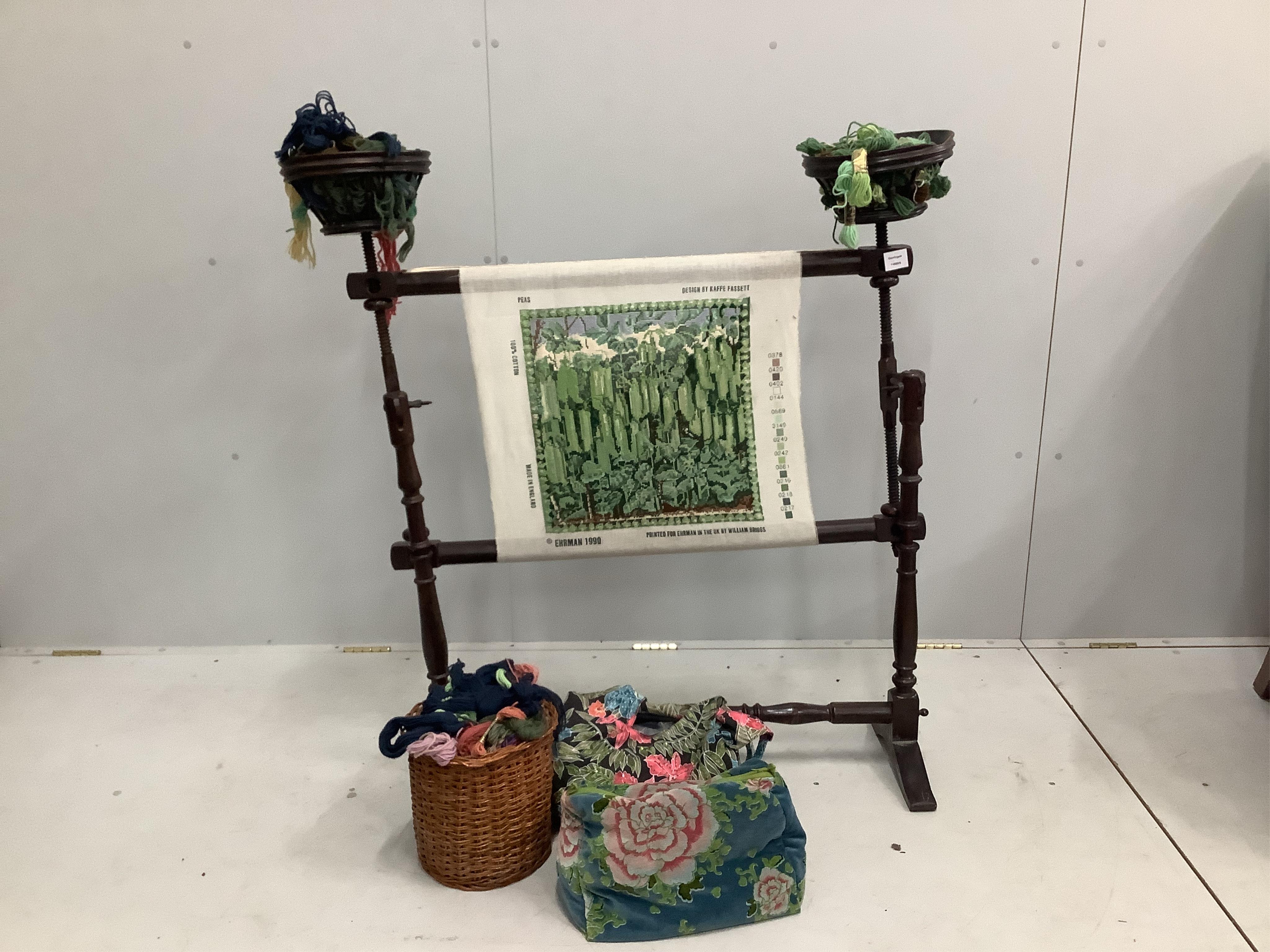 A turned wood embroidery loom with tapestries and threads, width 110cm, height 115cm. Condition - good